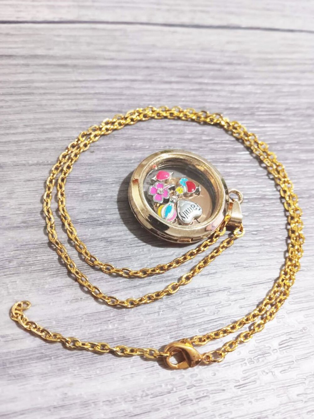 29mm Gold tone Floating necklace with charms and a small plate